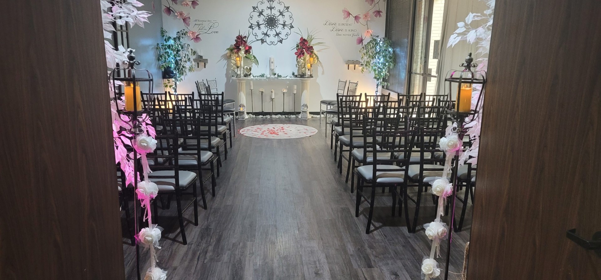 View through The Chapel entrance toward the ceremony space and floral aisle details.